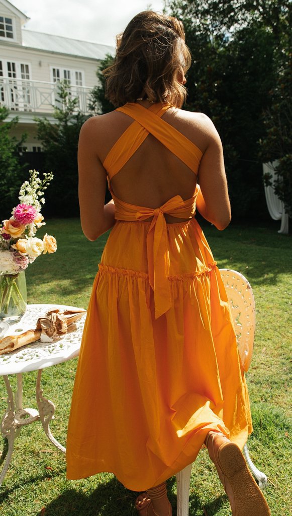 Robe maxi femme avec décolleté dans le dos et nœuds sur les côtés Levoire