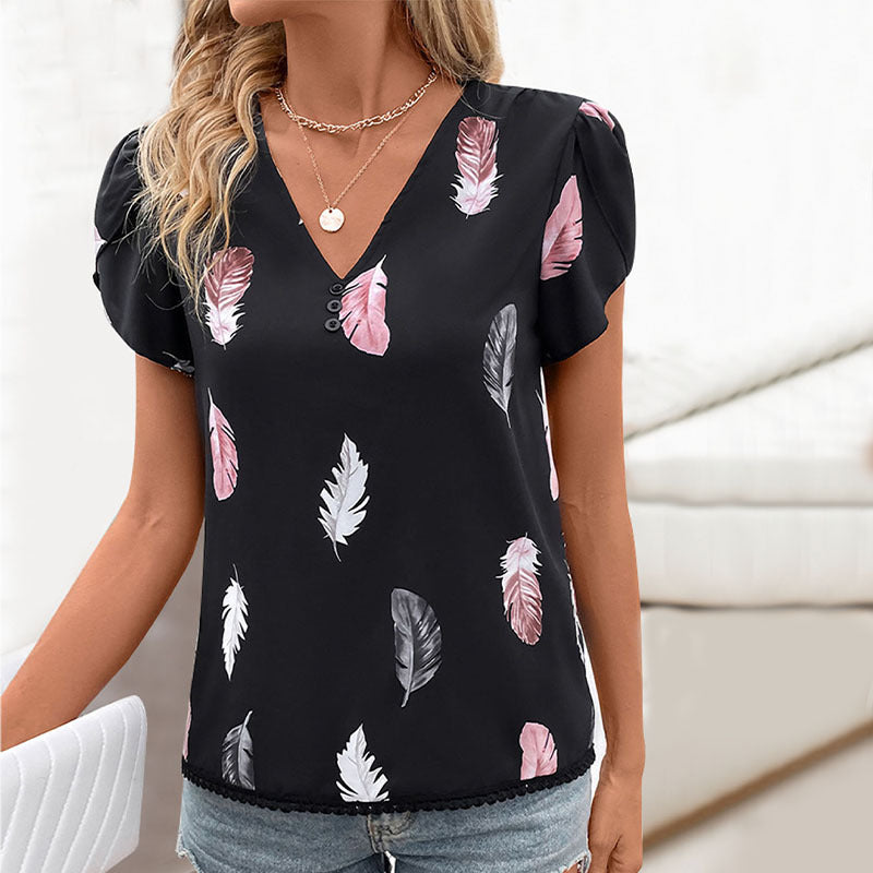 Haut féminin avec motif floral en feuilles et détails de boutons décoratifs Levoire