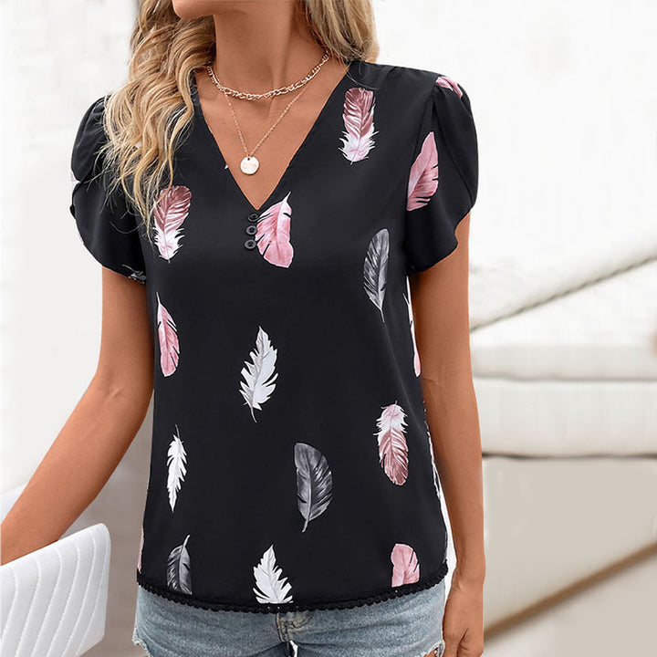 Haut féminin avec motif floral en feuilles et détails de boutons décoratifs Levoire