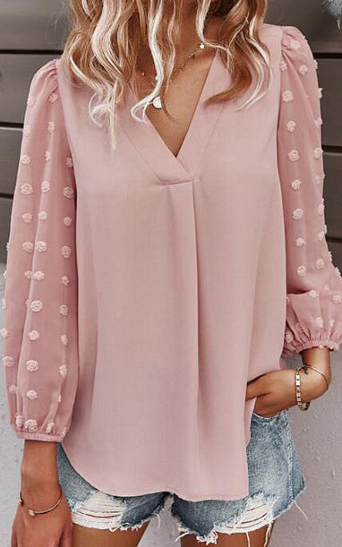 Blouse pour femmes avec des manches bouffantes transparentes et un détail à pois Levoire