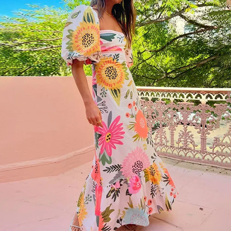 Robe maxi femme avec manches bouffantes et détails imprimés floraux Levoire
