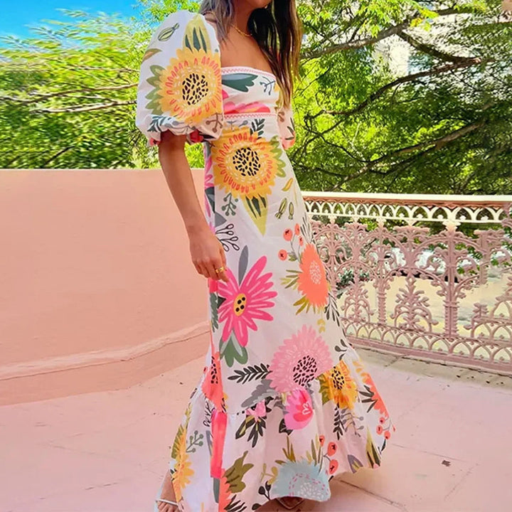 Robe maxi femme avec manches bouffantes et détails imprimés floraux Levoire