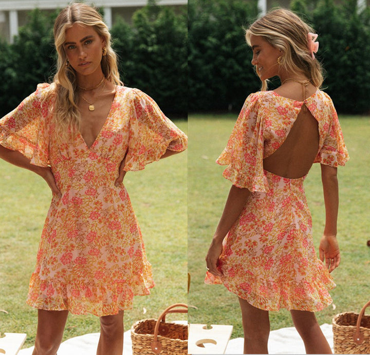 Robe portefeuille mini pour femme avec des manches volumineuses et découpe romantique au dos Levoire