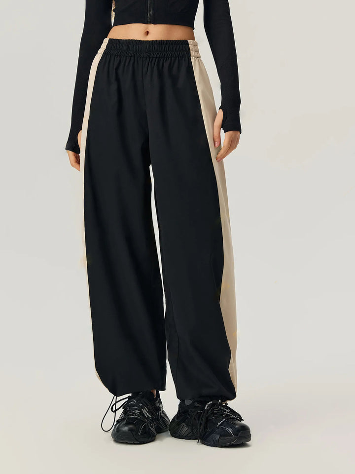 Pantalons de loisirs sportifs pour femmes avec coupe tendance et panneaux contrastés sur les côtés Levoire