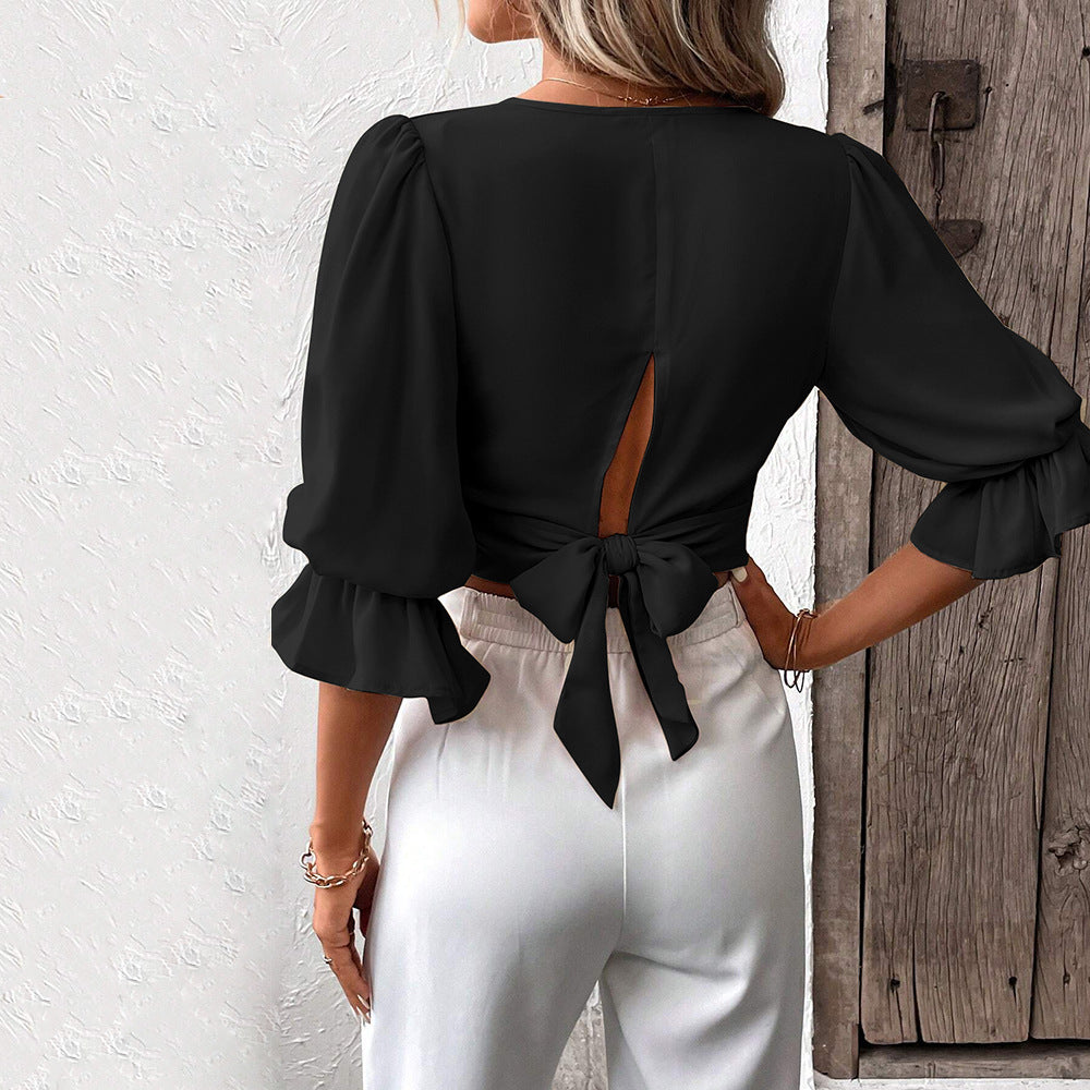 Top court chic pour femmes avec des manches bouffantes élégantes et un col en V Levoire