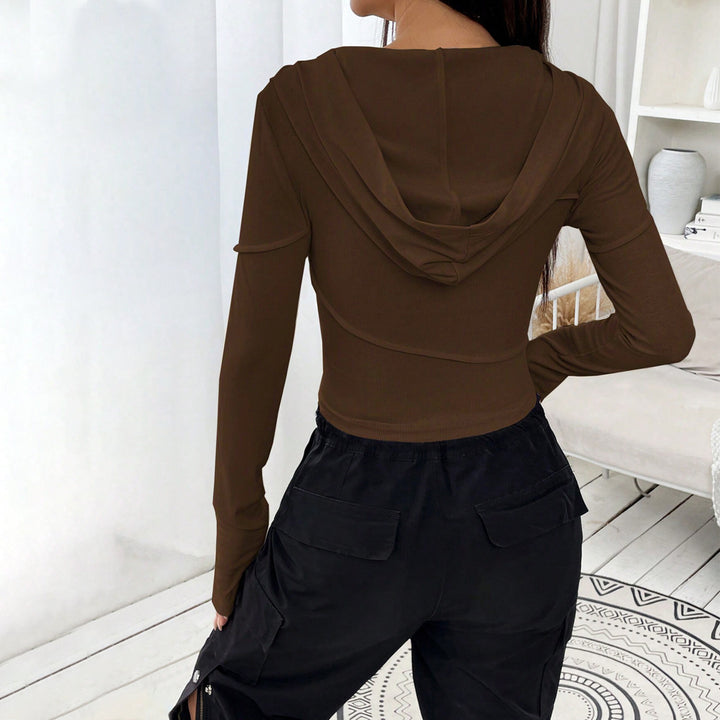 Femme crop top avec design élégant à capuche et manches longues Levoire