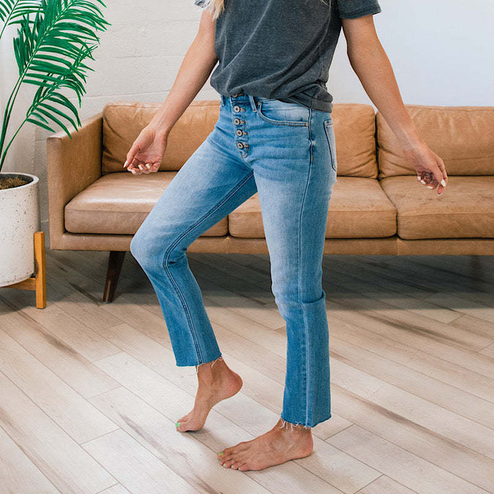 Jean femme taille haute avec insert à boutons et ourlet effiloché Levoire