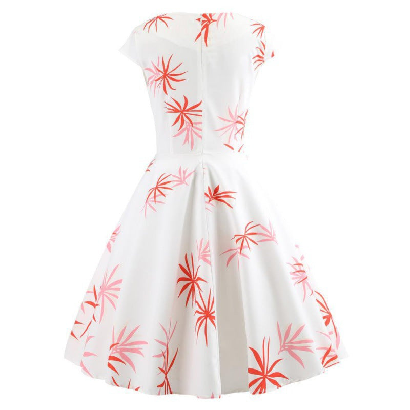 Robe à swing pour femmes avec un design enveloppant élégant et des accents floraux Levoire