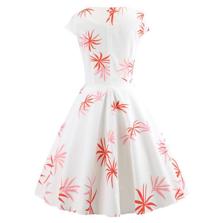 Robe à swing pour femmes avec un design enveloppant élégant et des accents floraux Levoire