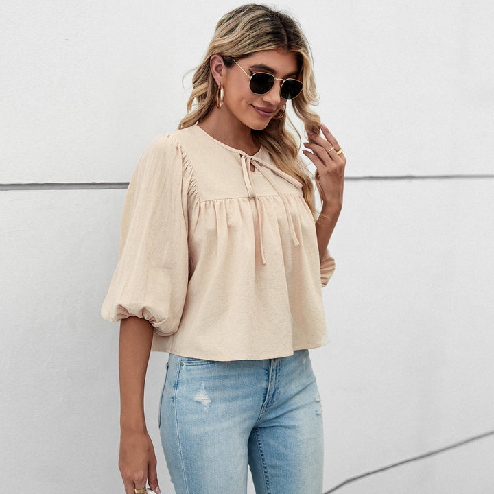 Blouse pour femmes avec des manches larges et un nœud ludique Levoire