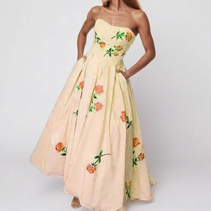Robe maxi élégante sans bretelles pour femmes avec design floral et poches latérales Levoire