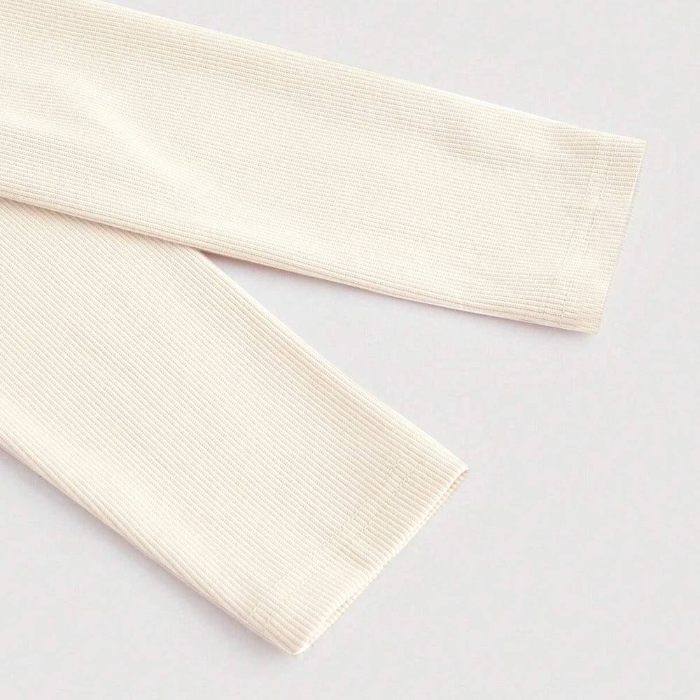 Chemise courte à manches longues pour femmes avec encolure asymétrique et texture fine côtelée Levoire
