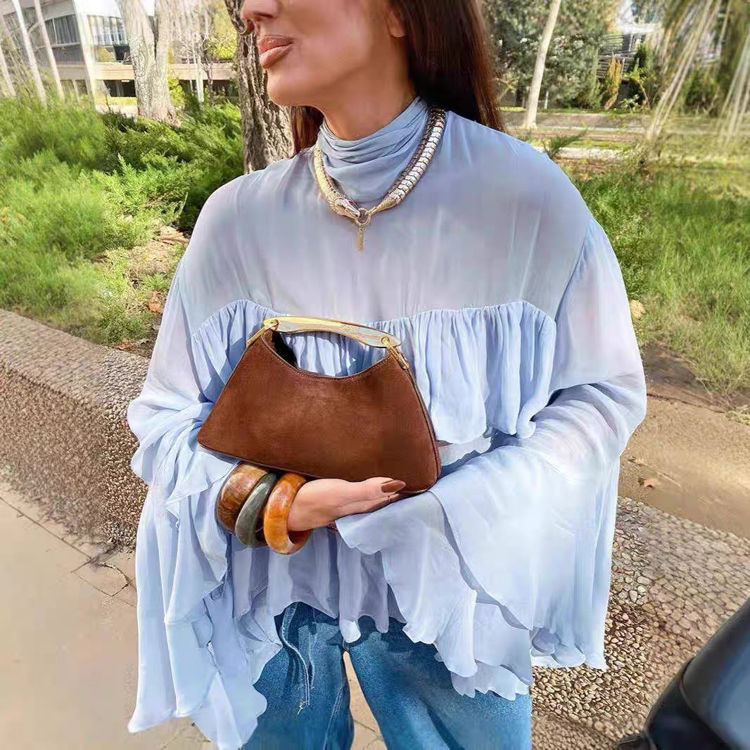 Blouse pour femmes avec un design de volants volumineux et des manches larges et flottantes Levoire