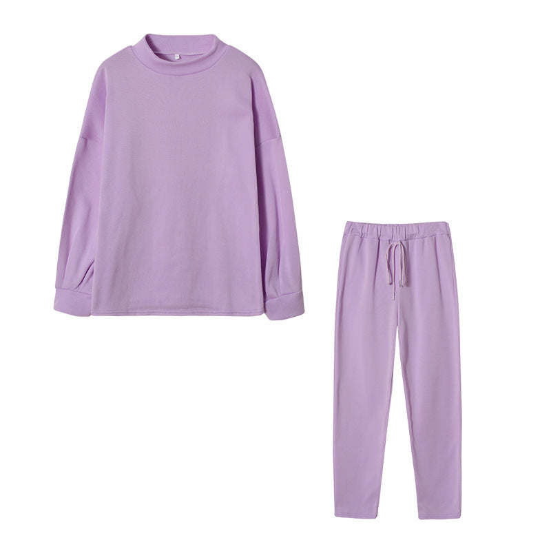 Ensemble de survêtement pour femmes avec une coupe moderne, un haut à col montant et un pantalon élastique Levoire