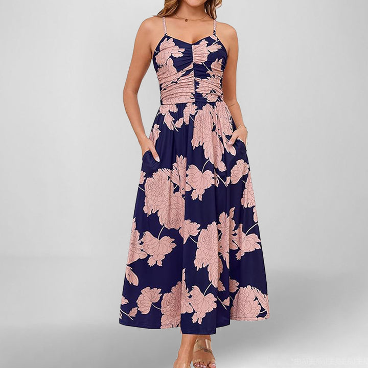 Robe maxi femme avec fines bretelles et poches latérales pratiques Levoire