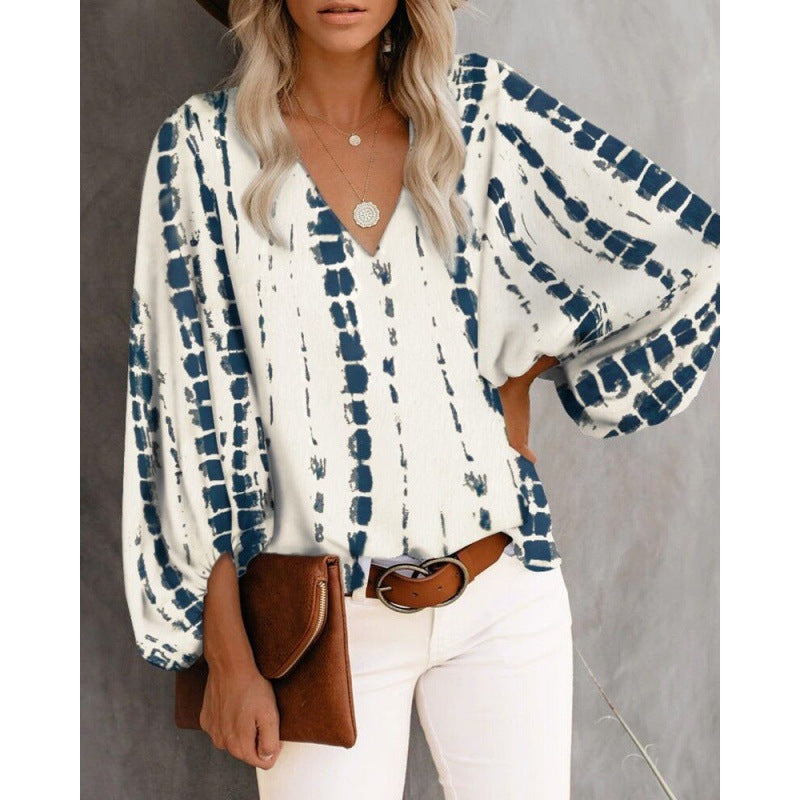 Blouse féminine à la mode avec des manches larges et un col en V Levoire