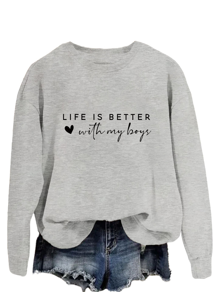 Pull femme confortable à col rond avec impression inspirante Levoire