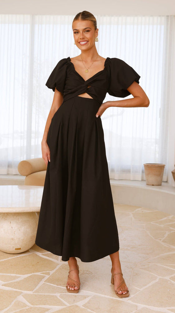Robe midi femme avec un détail de nœud ludique et un design à manches bouffantes Levoire