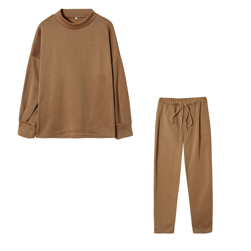 Ensemble de survêtement pour femmes avec une coupe moderne, un haut à col montant et un pantalon élastique Levoire