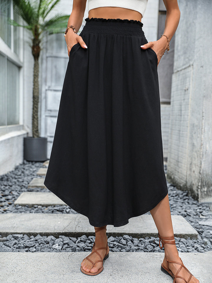 Jupe midi pour femmes avec taille élastique et poches latérales pratiques Levoire