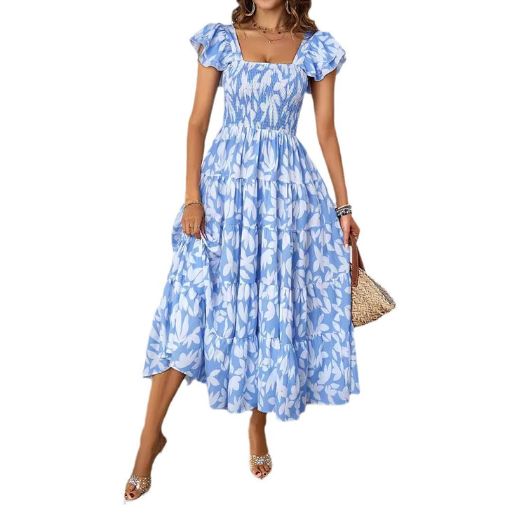 Robe maxi pour femmes avec des manches bouffantes volumineuses et un corps froncé Levoire