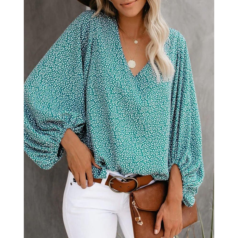 Blouse féminine à la mode avec des manches larges et un col en V Levoire