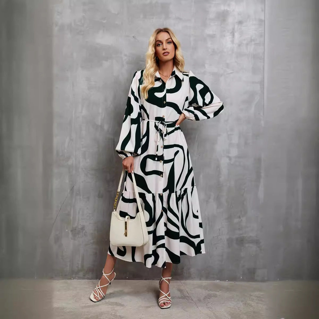 Robe à manches longues pour femmes avec motif à la mode et ceinture pratique.