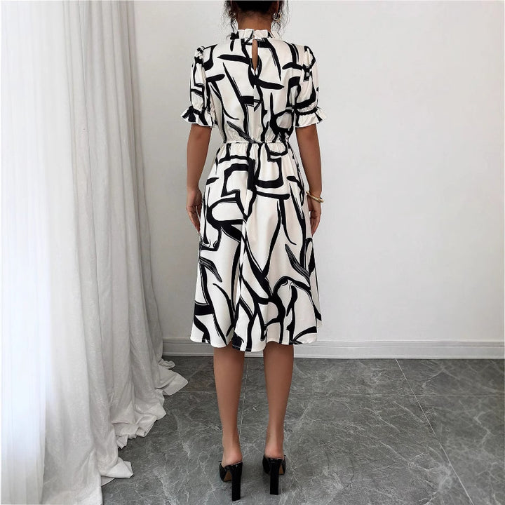 Robe midi élégante pour femmes avec motif de plantes stylé et taille élastique Levoire