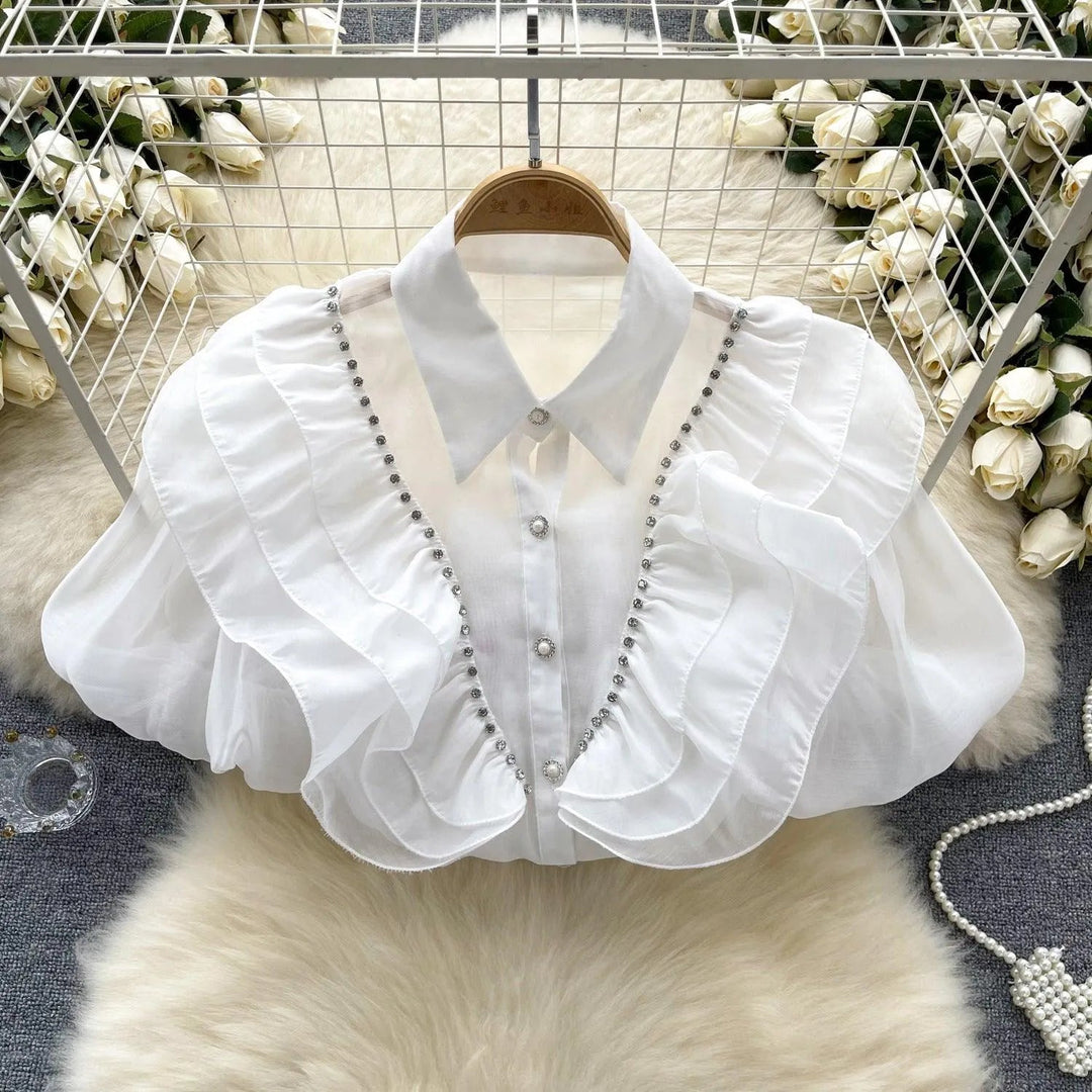 Levoire | Top avec des diamants transparents et fins et des manches bouffantes Blanc Taille libre