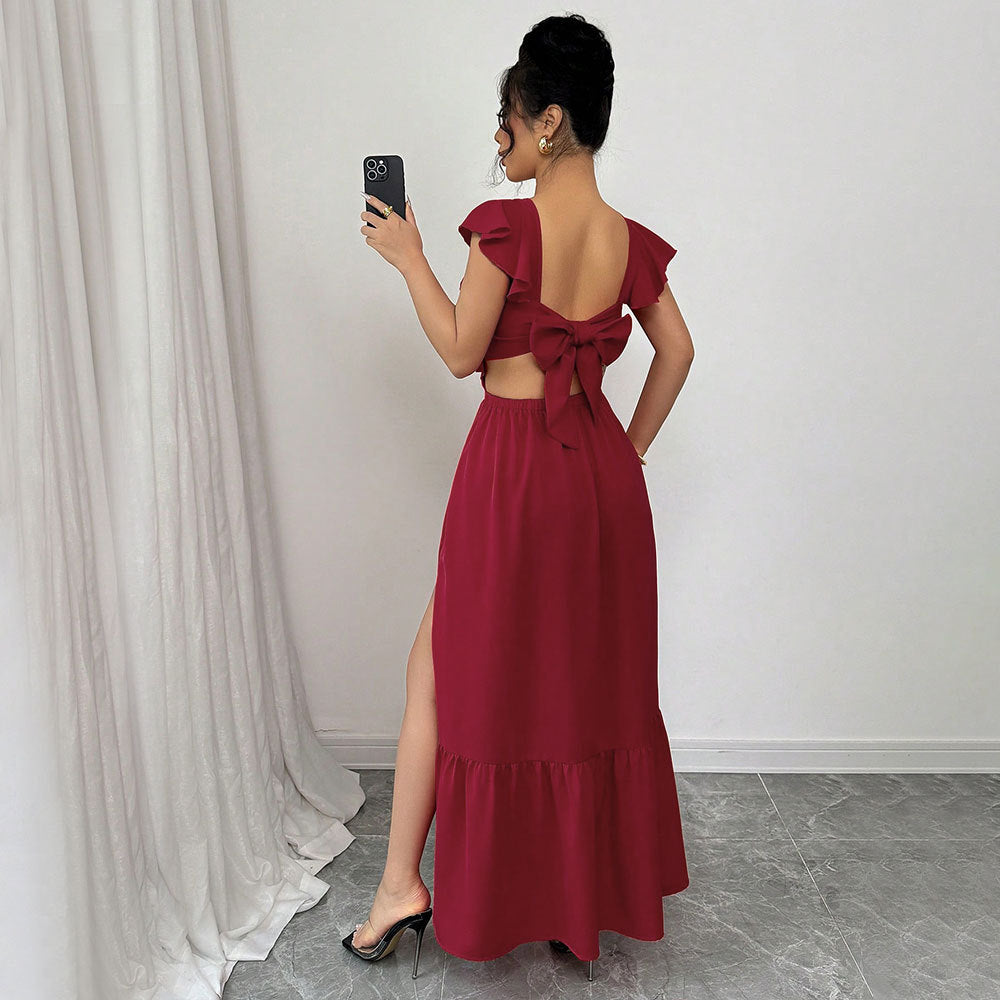 Robe maxi femme avec des détails de volants volumineux et une découpe sophistiquée dans le dos Levoire