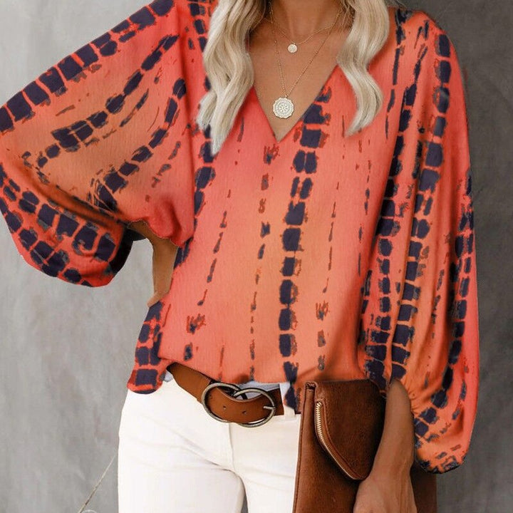Blouse féminine à la mode avec des manches larges et un col en V Levoire