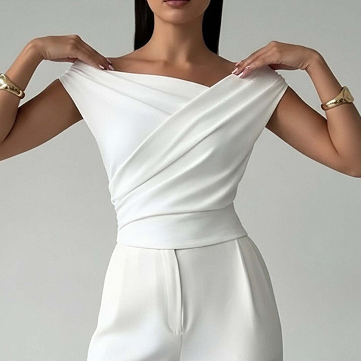 Haut Élégant Femme avec Look Enveloppé et Accent sur la Découpe Levoire