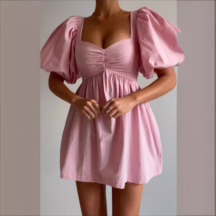 Robe décontractée pour femmes avec des manches bouffantes et un élégant drapé Levoire