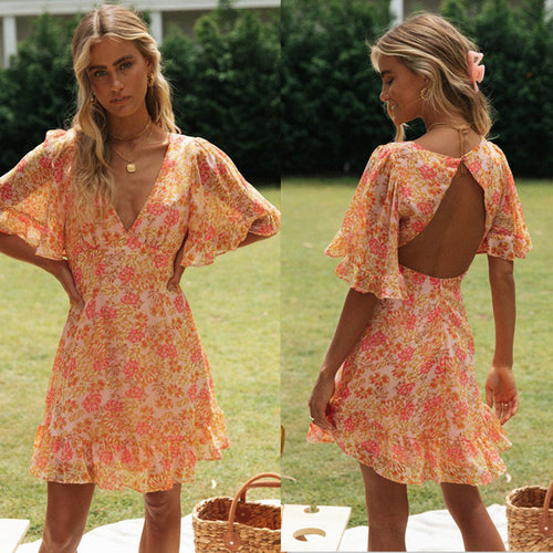 Robe portefeuille mini pour femme avec des manches volumineuses et découpe romantique au dos Levoire