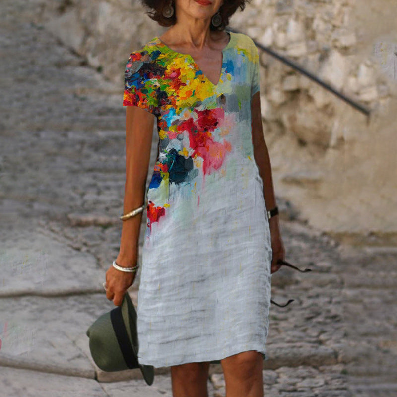 Levoire | Robe à col en V imprimée élégante à manches courtes 19 Peinture à l'huile colorée