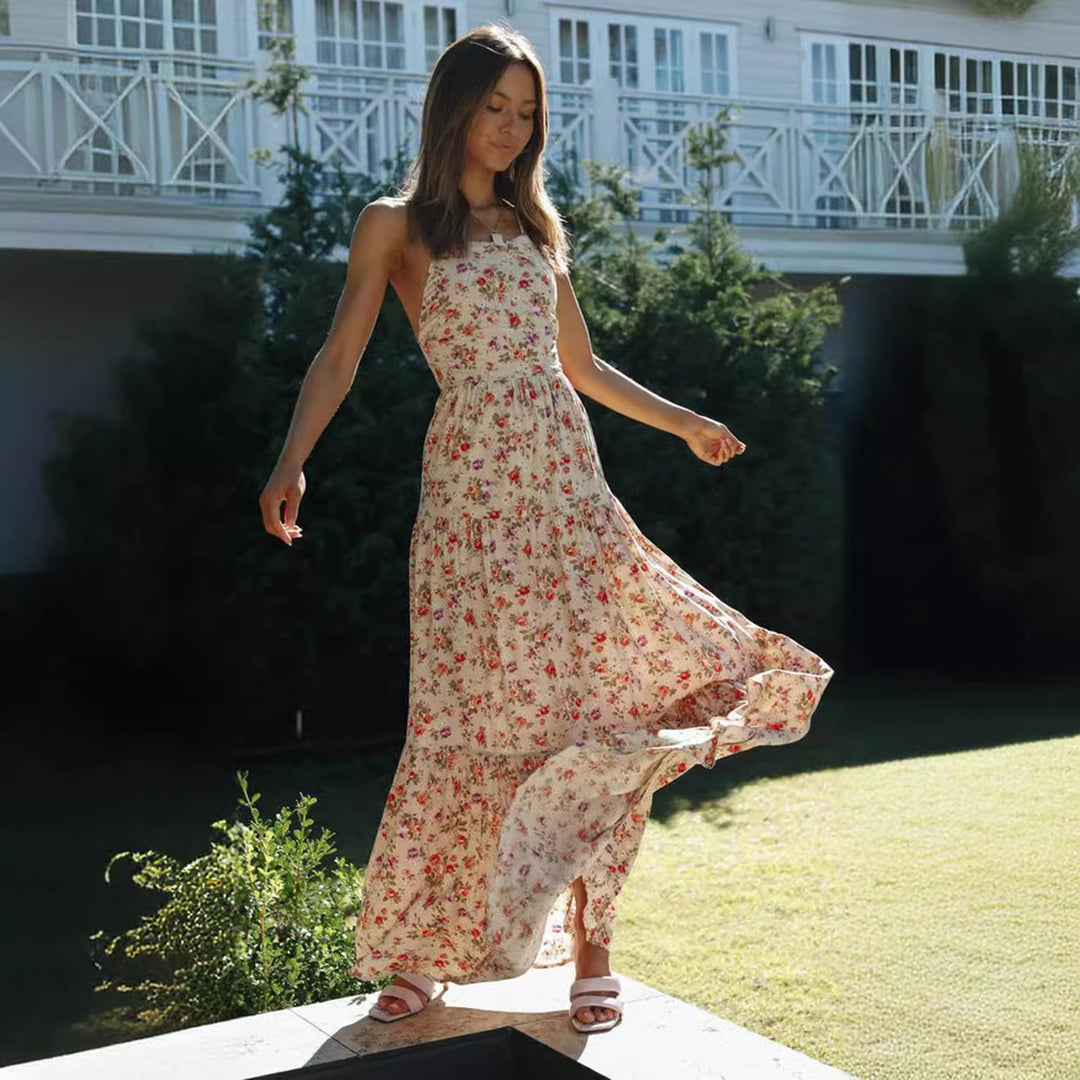 Robe maxi pour femmes avec des imprimés floraux délicats et des bretelles spaghetti sophistiquées Levoire