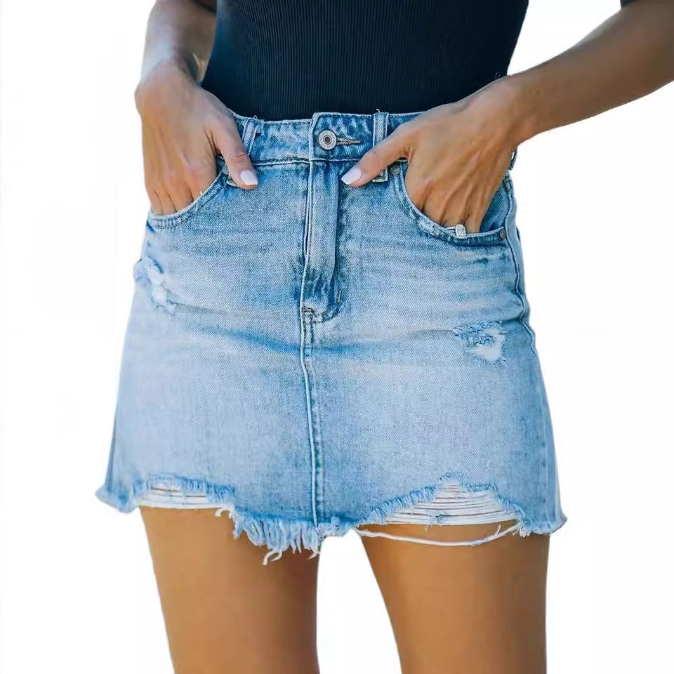 Jupe mini en jean pour femmes avec look usé, franges et taille haute Levoire