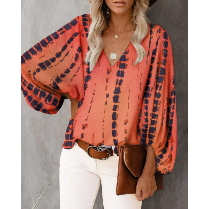 Blouse féminine à la mode avec des manches larges et un col en V Levoire