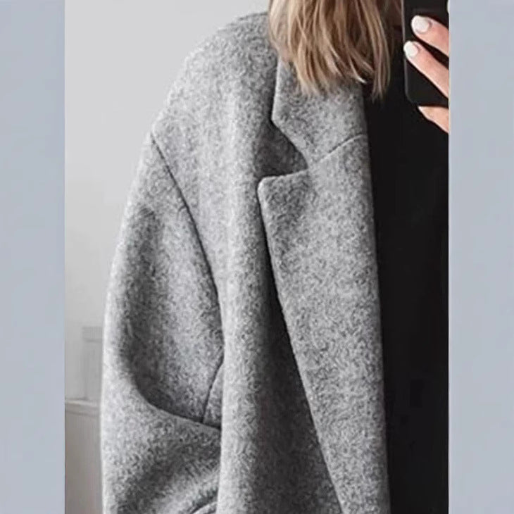 Manteau en laine oversize pour femmes avec patte de boutonnage double et coupe élégante Levoire