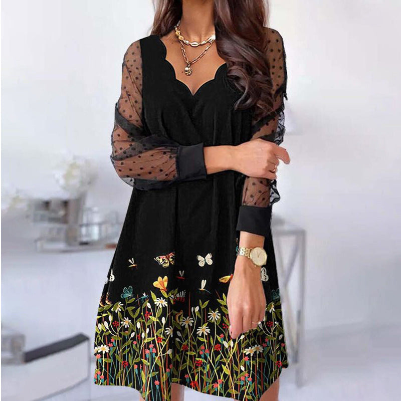 Levoire | Robe longue à manches longues en filet transparent avec décolleté en V papillon
