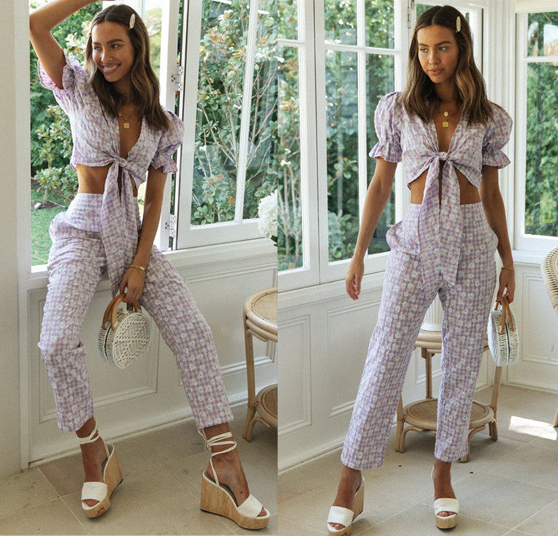 Ensemble femme en deux pièces avec un haut orné de nœuds et un pantalon à coupe large Levoire