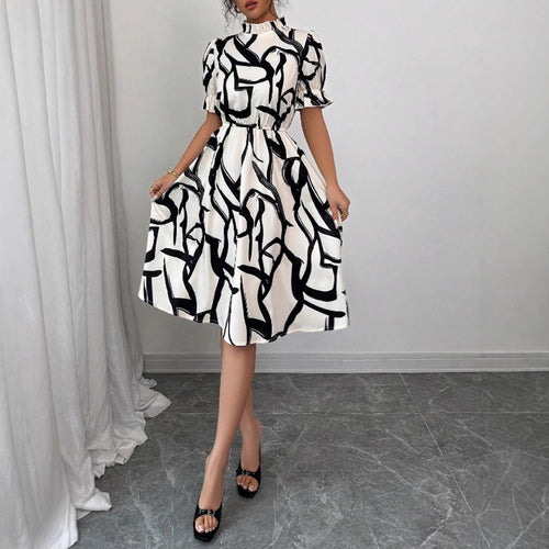 Robe midi élégante pour femmes avec motif de plantes stylé et taille élastique Levoire