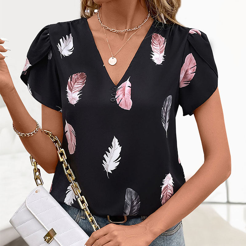 Haut féminin avec motif floral en feuilles et détails de boutons décoratifs Levoire