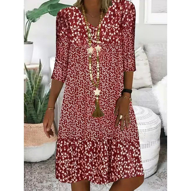 Levoire | Robe midi à col en V avec manches trois quarts à imprimé élégant
