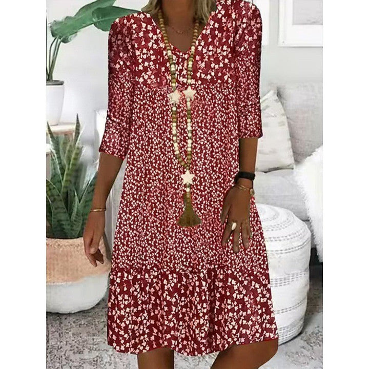 Levoire | Robe midi à col en V avec manches trois quarts à imprimé élégant