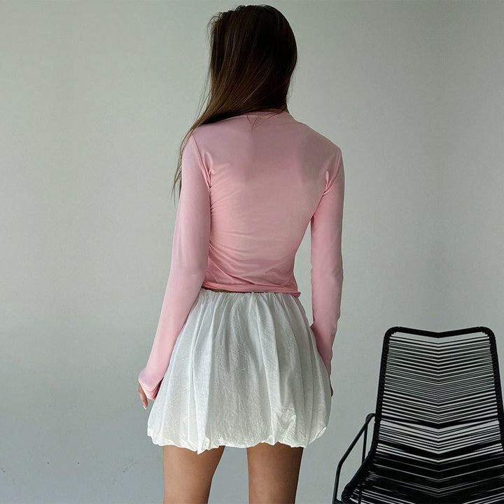 T-shirt à manches longues pour femmes avec un design de nœud ludique et une silhouette près du corps Levoire