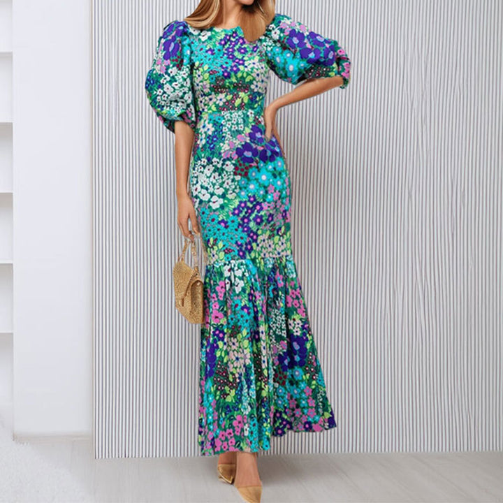 Robe maxi pour femmes avec des manches bouffantes volumineuses et des motifs floraux Levoire