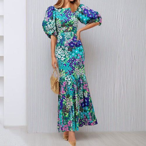 Robe maxi pour femmes avec des manches bouffantes volumineuses et des motifs floraux Levoire