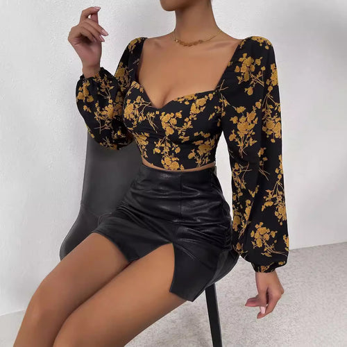 Top court féminin avec motif floral et élégante manches bouffantes Levoire
