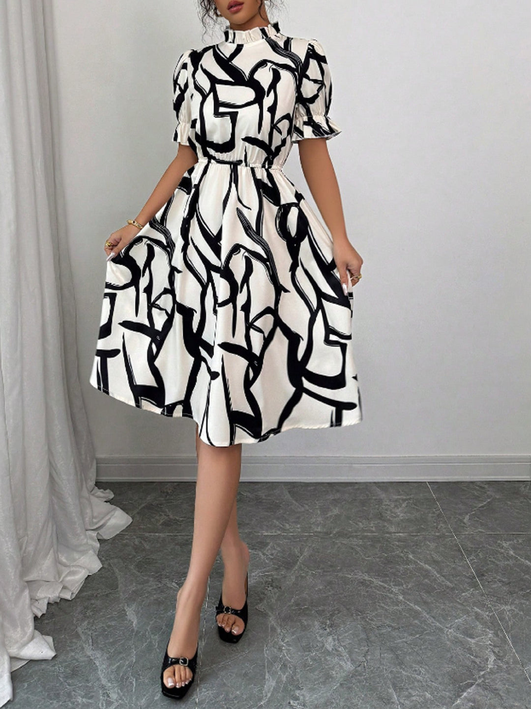 Robe midi élégante pour femmes avec motif de plantes stylé et taille élastique Levoire